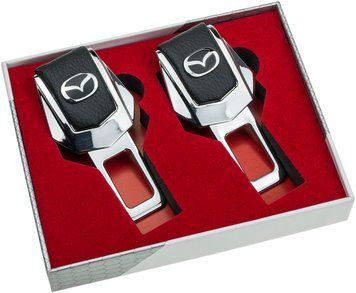 Заглушки ремней безопасности "MAZDA" премиум качества (Авиационная сталь, черная кожа, к-кт 2шт)